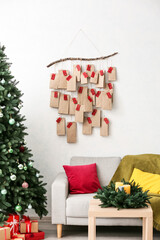 Christmas advent calendar hanging on wall in living room