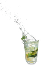 Glass of splashing lemonade on white background