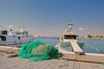 Fishing boats and nets in the harbor