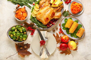 Composition with tasty baked turkey and different food for Thanksgiving Day on light background