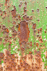 Old Iron painted white lime green and white rusted background	