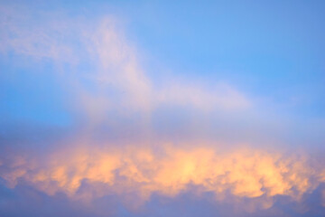 Naklejka na ściany i meble The beautiful scenery consists of orange clouds and blue sky.