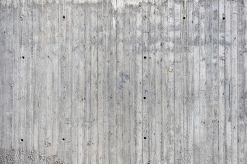 unplastered, smooth and solid bare concrete wall