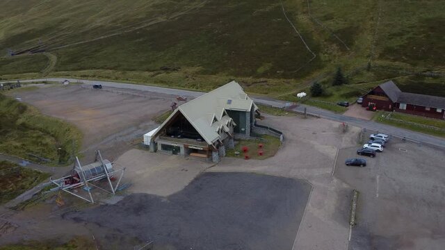 Lecht Ski Centre on an overcast day, Cairngorms National Park, Scotland. Circling left to right around the front of the ski centre.