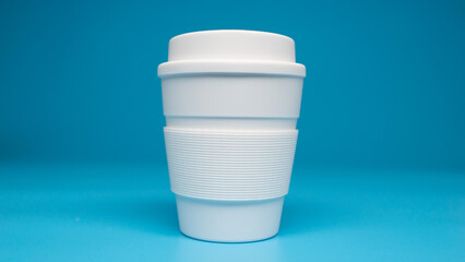 ZERO WASTE: Single White reusable mug on a blue background in a center - 460215188