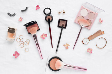 Makeup and beauty items flatlay