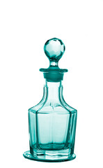 Green glass bottle of perfume isolated on white background.