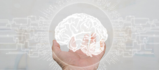 Close up of businessman holding digital image of brain in palm
