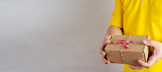 Deliveryman hold parcel box. Freight transportation. Express delivery. Web article template.