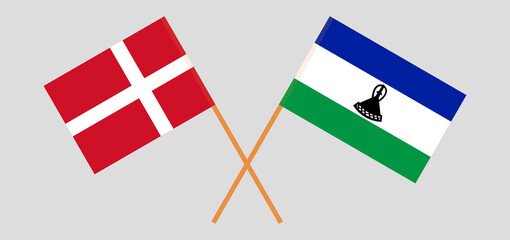 Crossed flags of Denmark and the Kingdom of Lesotho. Official colors. Correct proportion