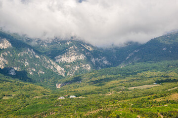 Naklejka na ściany i meble Crimean mountains in foggy clouds