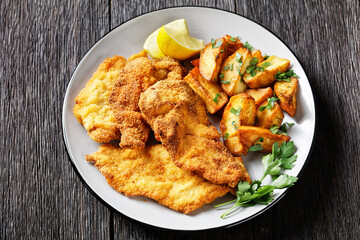 crispy Chicken Cutlets with spicy roasted potatoes