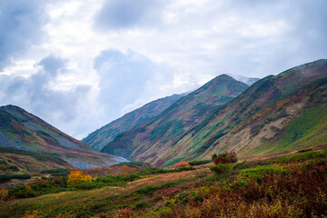 Naklejka premium 富山県立山町の立山の秋の紅葉の季節に登山している風景 Scenery of climbing Tateyama Mountain in Tateyama Town, Toyama Prefecture, Japan during the season of autumn leaves. 