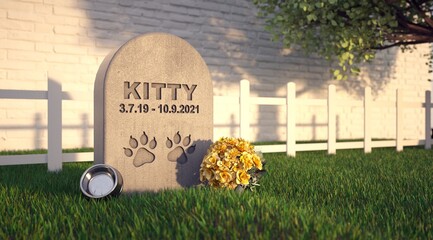 Pet grave in the garden. Gravestone with the cat's name.