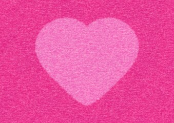 大きなハートマークのあるピンク色のフェルト生地の背景