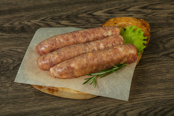 Raw pork meat sausages for grill
