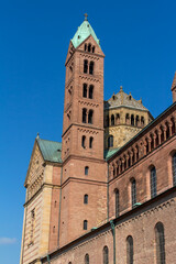 Fototapeta na wymiar Close, upward view of the Speyer Cathedral, also called the Imperial Cathedral Basilica of the Assumption and St Stephen, in Speyer, Germany.