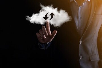 Cloud technology. Polygonal wireframe cloud storage sign with two arrows up and down on dark ....
