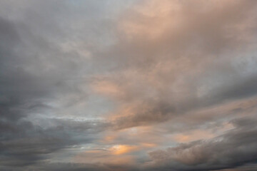Naklejka na ściany i meble Beautiful clouds at sunrise. Light pastel colors. Nature background.