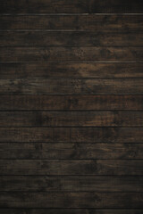 Obraz na płótnie Canvas Dark brown wooden background. Timber board texture