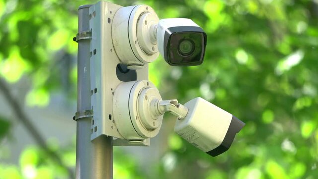 Security cameras on the pole in 4k slow motion 60fps