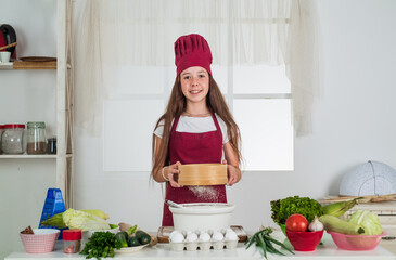 teen girl in cook uniform prepare food in kitchen, culinary