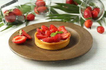 Concept of delicious food with strawberry tart, close up