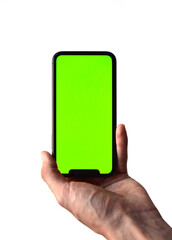 Photo of a hand holding a mobile device - iPhone template with green screen to add a customized image or text with chroma key - Smartphone blank screen to show an app, game or website on display