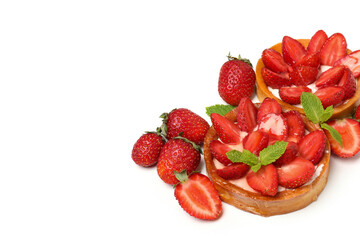 Delicious strawberry tarts isolated on white background