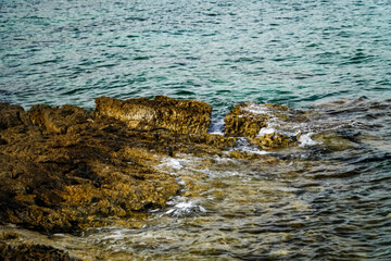 Fototapeta premium water hitting the rocks , the sea waves , the Adriatic Sea