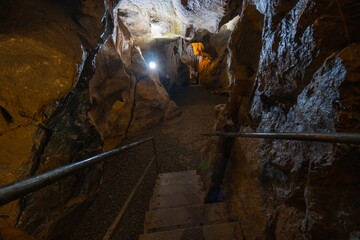 The interior of the cave. Ancient formations of stone. Touristic hiking route. Concept of excursions and attractions. (Cuceler magarasi) Tirilar, Sapadere, Alanya