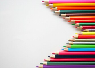 Fototapeta premium A horizontal row of colored pencils.