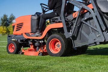 Mowing grass at the football field