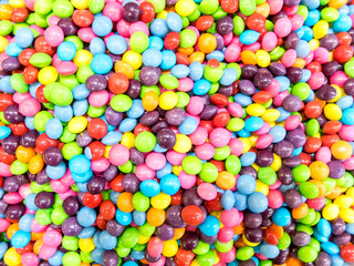 Fototapeta na wymiar Closeup of colorful candies as background