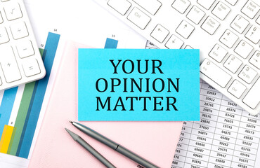 YOUR OPINION MATTER text on blue sticker on chart with calculator and keyboard,Business concept