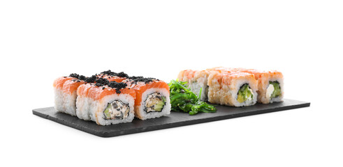 Delicious sushi rolls and chuka on white background