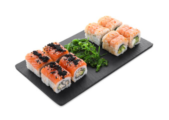 Delicious sushi rolls and chuka on white background