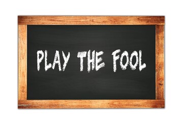 Obraz premium PLAY THE FOOL text written on wooden frame school blackboard.