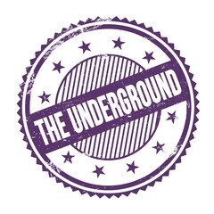 THE UNDERGROUND text written on purple indigo grungy round stamp.