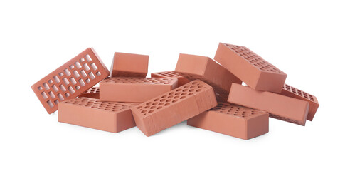 Pile of red bricks on white background. Building material