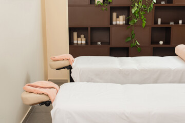 Massage tables with towels in spa center