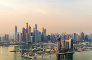 Fototapeta na wymiar Dubai, UAE - 09.24.2021 Dubai city skyline on early morning hour. Dubai Marina. Urban