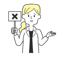 バツが書かれた札を持っている医師