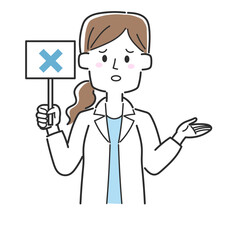 バツが書かれた札を持っている医師