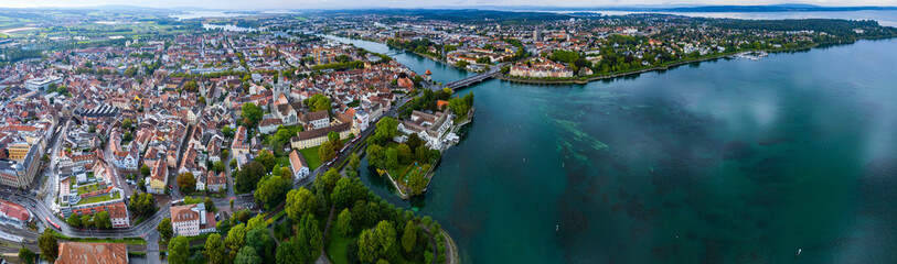 Fototapeta na wymiar Aerial view of the city constance beside the lake Bodensee on a rainy day in summer.