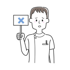 バツの書かれた札を持っている看護師