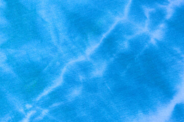 Close up tie dye fabric pattern. Hand made texture.