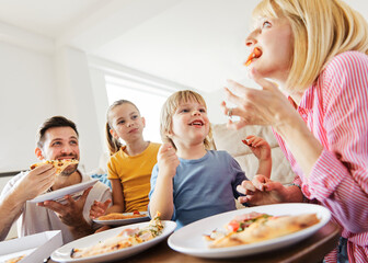 pizza family child food home eating son daughter mother father happy meal together lunch dinner man...