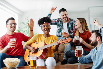 girl boy couple party guitar playing music drinking beer bottle fun friend man women together alcohol drink