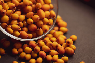 orange berries in a glass bowl
